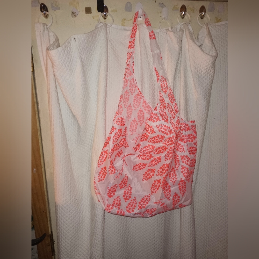 FREE PEOPLE MOVEMENT lightweight oversized sling tote.